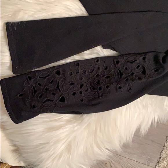 Fabletics leggings with floral design on left leg - Picture 2 of 3